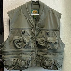 Worn once, Cabela’s fishing vest